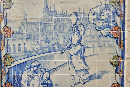 azulejos panel representing monuments and country scenes on the walls of Leiria station, Portugal..