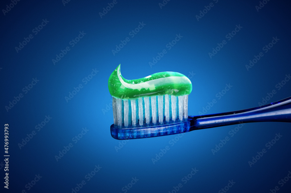 Toothpaste on a brush. Green toothpaste with crystals. Brush and toothpaste. Toothpaste on a brush. Green toothpaste with crystals. Brush and toothpaste.