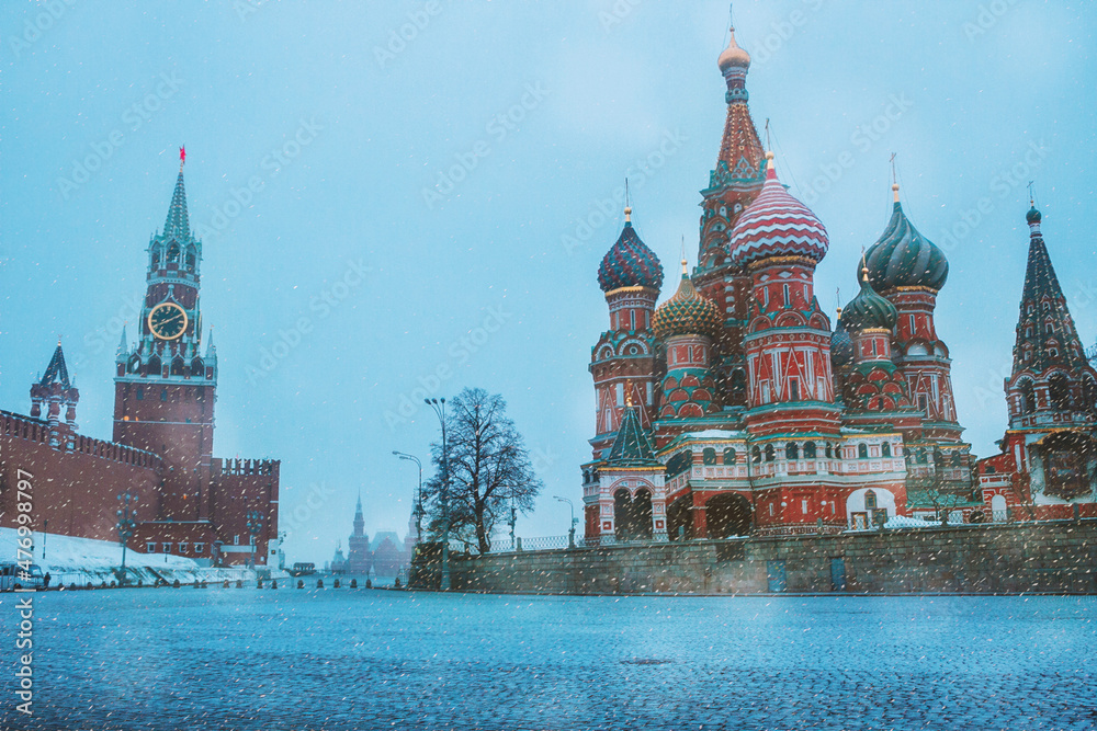 Fototapeta premium Saint Basil`s cathedral, Spasskaya tower and red square in Moscow. Winter morning in the historical centre of Moscow, Russia