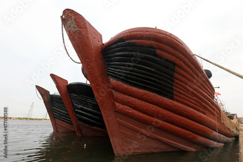 Ships berthing during the summer fishing moratorium are at a fishing port wharf, North China photo