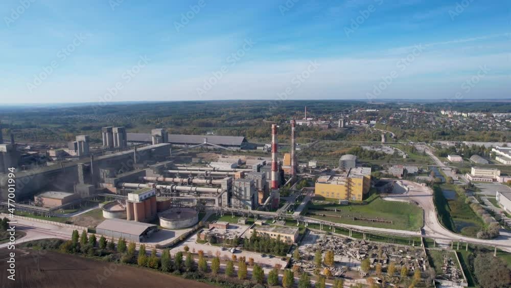Cement plant with pipes. Сement production process and Industrial solution. factory with smoke pipe. Chimney smokestack emission. Poor environment. Ecology concept, air and environmental pollution. Cement plant with pipes. Сement production process and Industrial solution. factory with smoke pipe. Chimney smokestack emission. Poor environment. Ecology concept, air and environmental pollution.