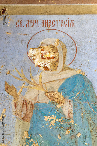 painting the walls of an abandoned temple