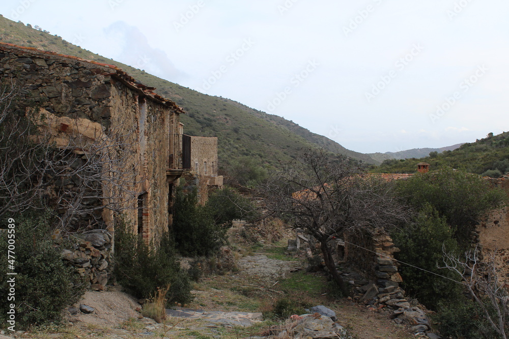 Abandoned mountain village houses. Ghost village. Old stone houses in abandoned village
