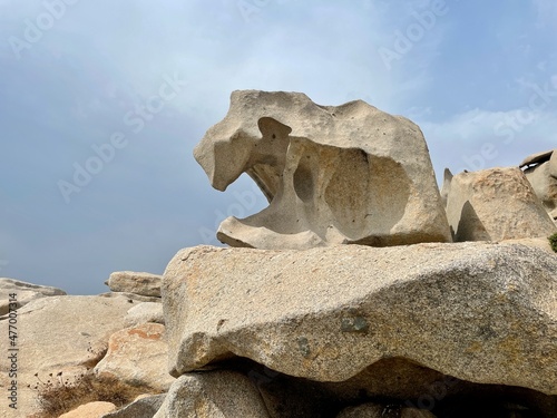 Bizarre rock formations, tafoni, on Lavezzi Island, marine reserve in Corsica, France. photo