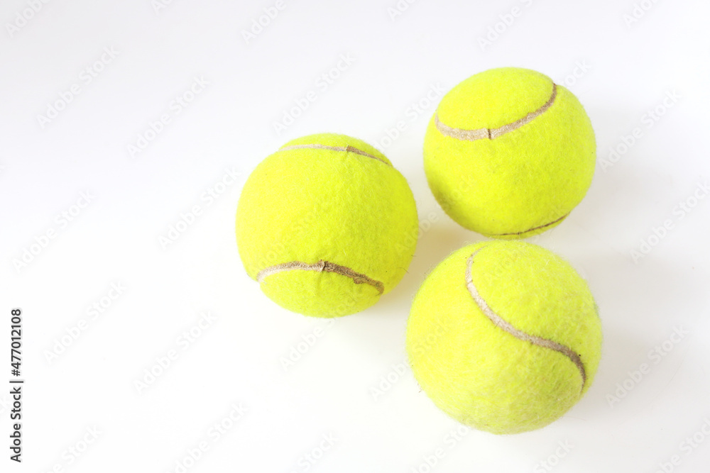 Tennis balls on white background, Isolated sport green balls. equipment closeup