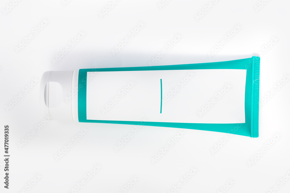 Cosmetic cream green tube. Sskincare cosmetic package. Plastic toothpaste tube. Product in green tubeisolated on white background. Clipping path included. Cosmetic cream green tube. Sskincare cosmetic package. Plastic toothpaste tube. Product in green tubeisolated on white background. Clipping path included.