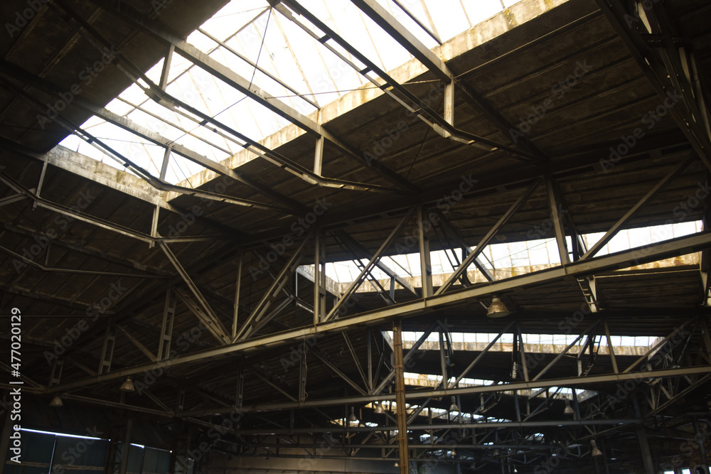 Steel and glass roof in old abandoned factory
