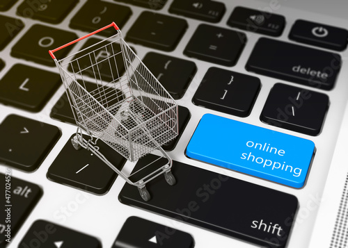 A shopping cart on the keyboard on a laptop - 3D illustration