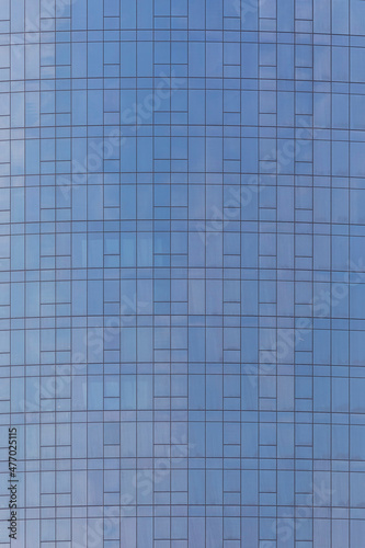 Glass facades of skyscraper...