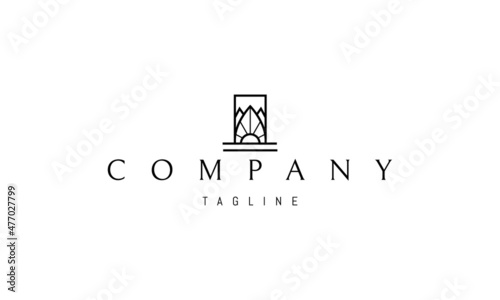 Vector logo with an abstract image of mountains in a rectangle and the sun at the bottom.
