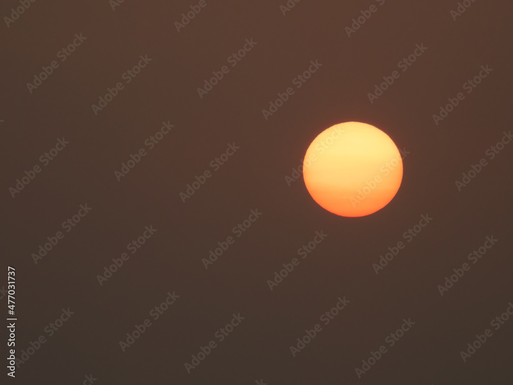 The Sun disk with visible spots. Taken on sunset on October 27, 2020 The Sun disk with visible spots. Taken on sunset on October 27, 2020