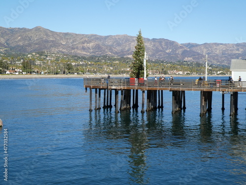 pier in the sea at xmas time in santa barbara, california