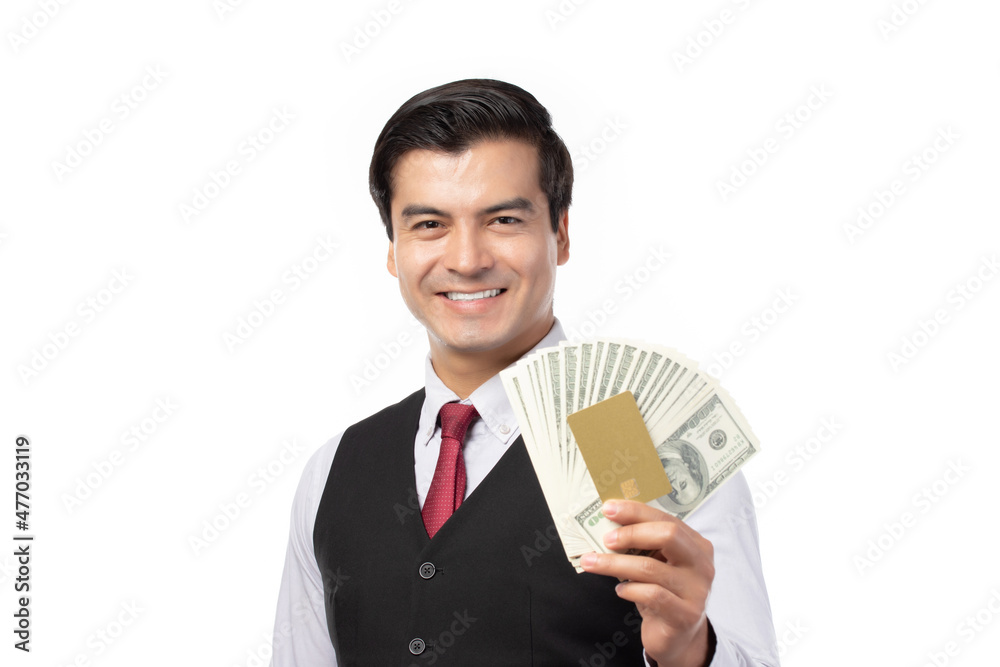 Handsome business man in black suit holding credit card and money isolated on white background. Business, technology, ecommerce and online payment concept. Handsome business man in black suit holding credit card and money isolated on white background. Business, technology, ecommerce and online payment concept.