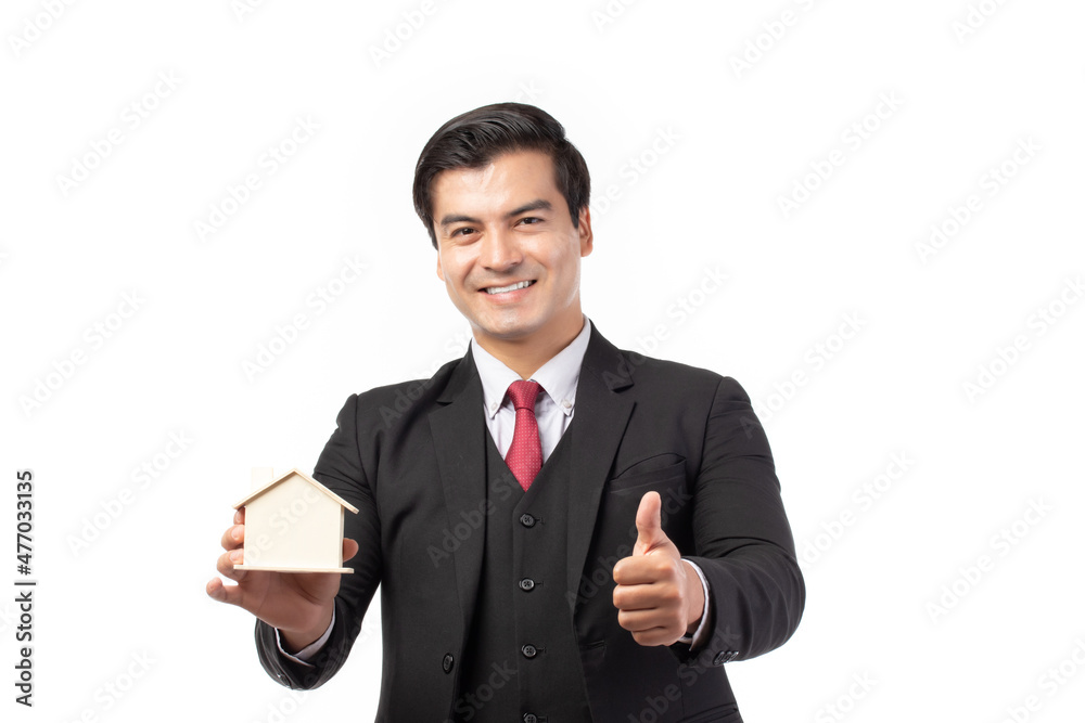 Businessman in black suit holding model house and money, save money for future, repair home and retirement isolated on white background. Business loans for real estate concept. Businessman in black suit holding model house and money, save money for future, repair home and retirement isolated on white background. Business loans for real estate concept.