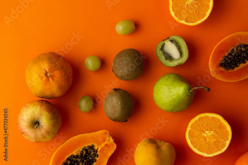 Conceptual photo of papaya and orange