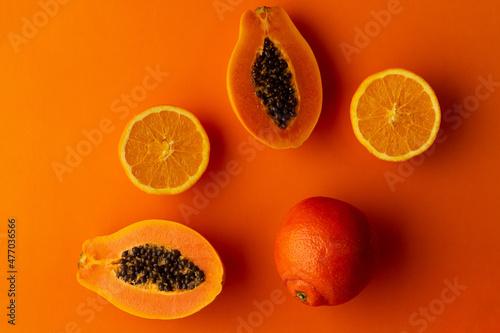 Conceptual photo of papaya and orange