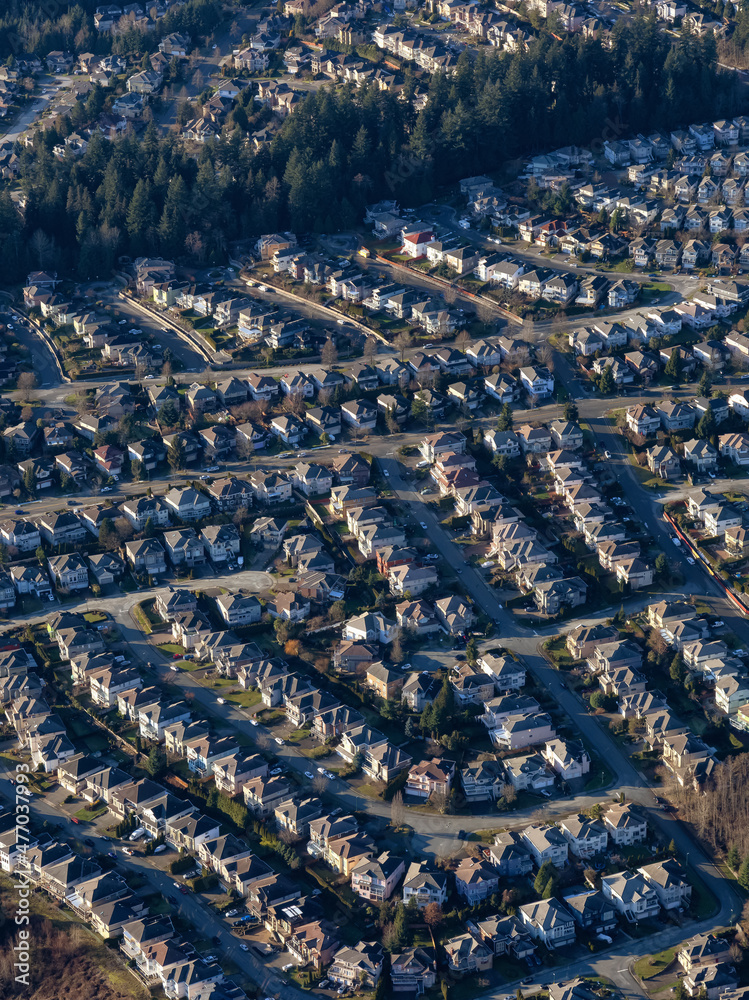 Fototapeta premium Aerial View of Residential Homes in a neighborhood of suburban modern city. Coquitlam, Vancouver, British Columbia, Canada.