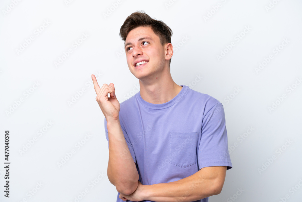 Young handsome Brazilian man isolated on white background pointing up a great idea