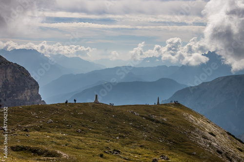clouds over mountain trail Tre Cime di Lavaredo in Dolomites in Italy