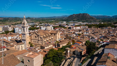 Jativa ,Valencia, Spain, Europe. Aerial photo from drone to Spanish town of Xativa on background of Roman Catholic Basilica. (Series) © Sandis