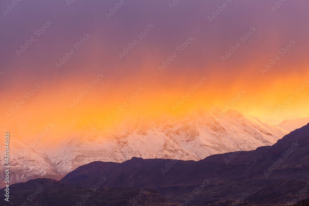 Sunrise over snow covered mountains in Patagonia, Chile
