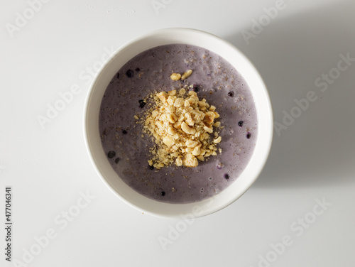 Food with muesli and asai blueberry smoothie photo