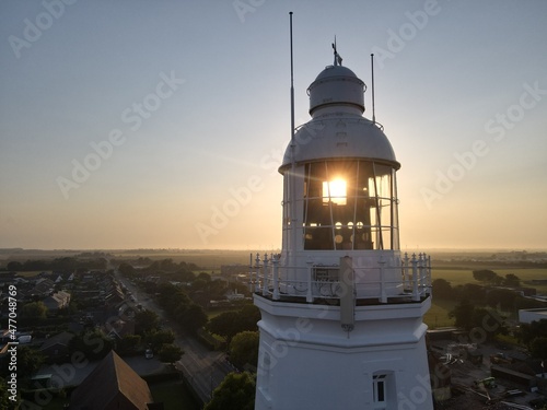 Winter sunset through the windows at the top of the 127 feet high Lighthouse in Withernsea, East Yorkshire, UK 