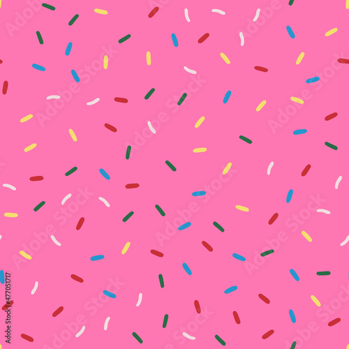 Seamless patterns of donut glaze with many decorative sprinkles.