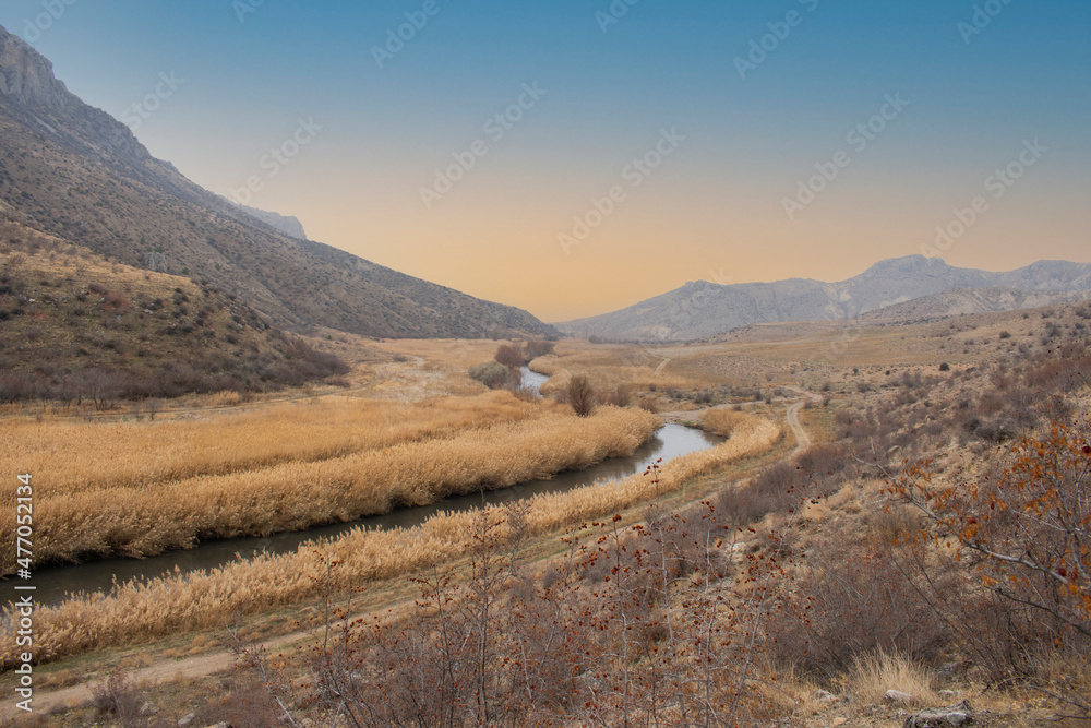 River in a valley on autumn