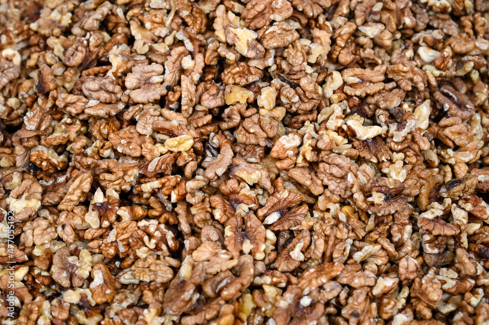 Walnuts for sale in market. Walnut kernels, close up. Bazaar. Dried walnuts in shop. Walnuts for sale in market. Walnut kernels, close up. Bazaar. Dried walnuts in shop.