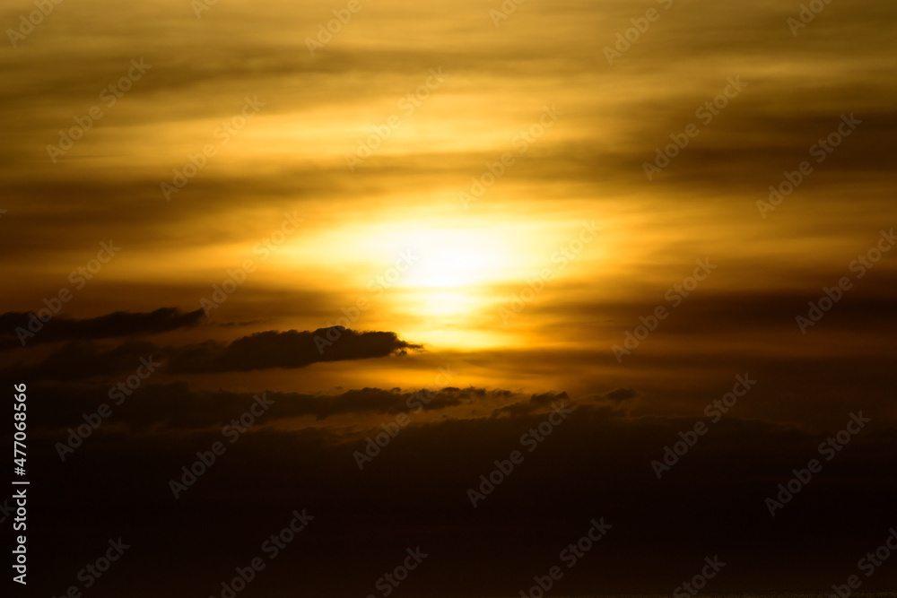 Beautiful sunset with glistening seas and romantic clouds. 