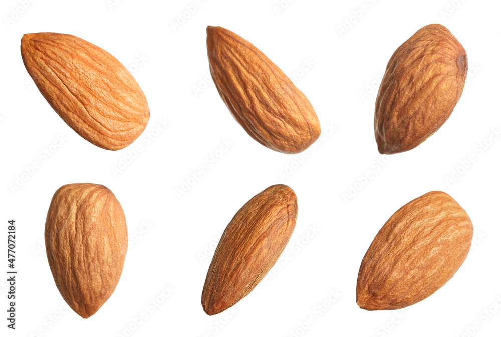 Set with tasty almonds on white background Set with tasty almonds on white background