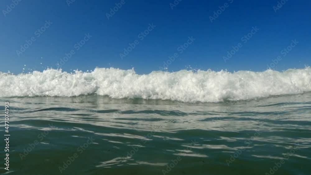 Unusual first person view of sea waves crashing on camera. Slow-motion Unusual first person view of sea waves crashing on camera. Slow-motion