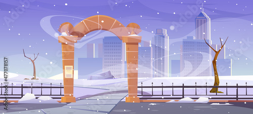 Winter landscape with stone arch entrance to public park, metal fence and city buildings on skyline. Vector cartoon illustration of town garden with archway portal, skyscrapers, bare trees and snow