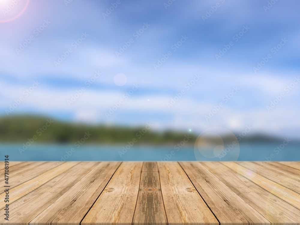 Wood table and beach and sky background for show product or graphics design. Wood table and beach and sky background for show product or graphics design.