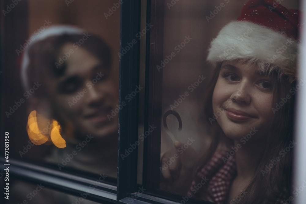 Boyfriend and girlfriend at Christmas. High quality photo