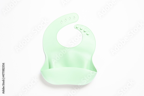 Mint silicone baby bib isolated on white  top view