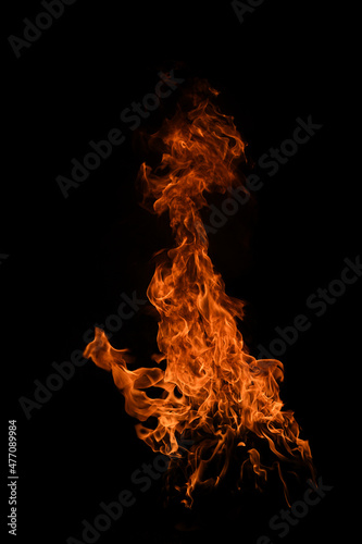Fire flames isolated on black background. Fire burn flame isolated, flaming burning art design concept with space for text. © Volodymyr