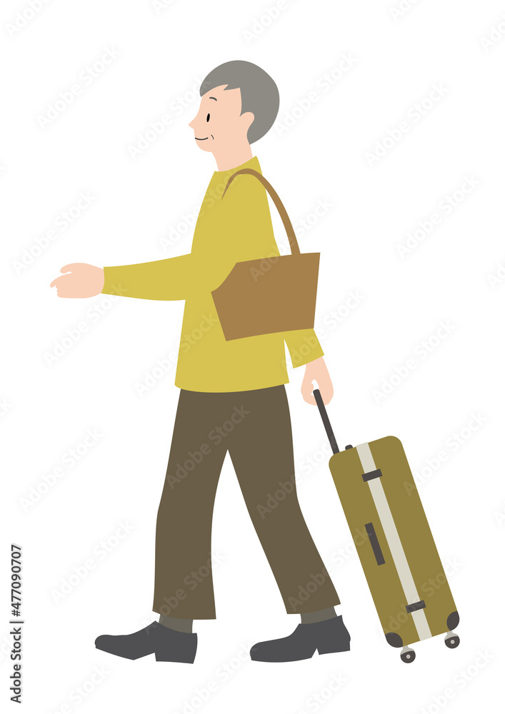 スーツケースを引っ張っているシニア男性（旅行等のイメージに）