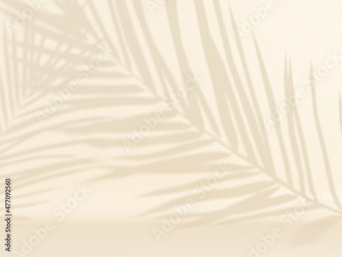 Tropical palm leaves on light pastel background. Unobtrusive botanical backgr...