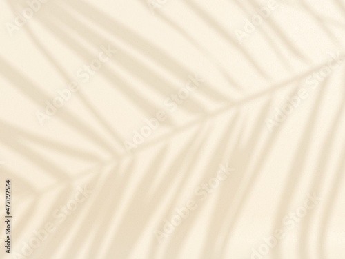 Tropical palm leaves on light pastel background. Unobtrusive botanical backgr...