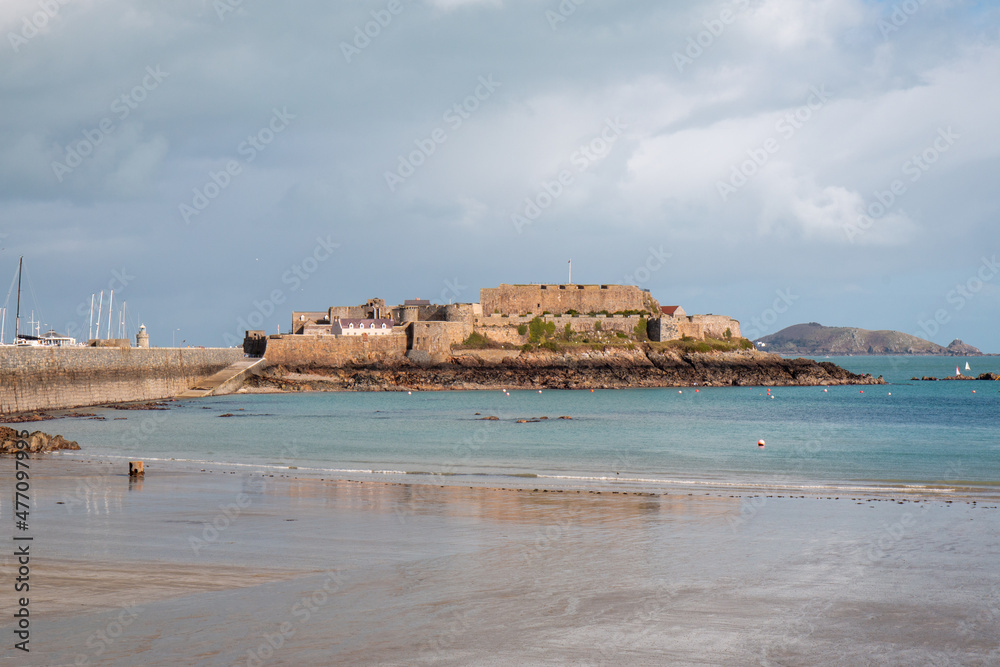 view of Castle Cornet over havelet beach, St Peter Port, Guernsey