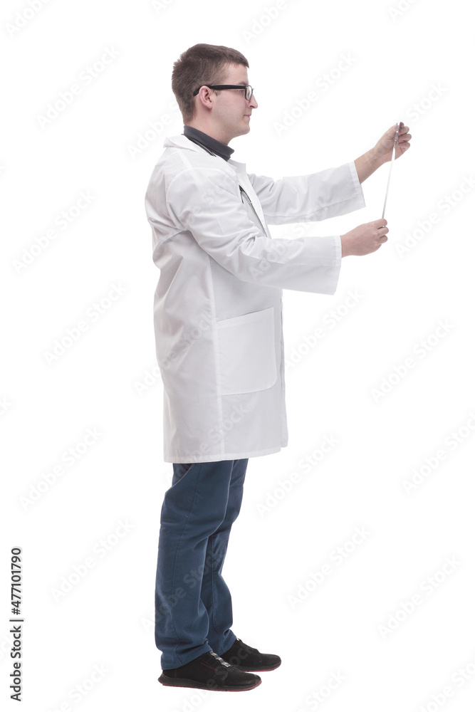in full growth. confident male doctor with an x-ray.