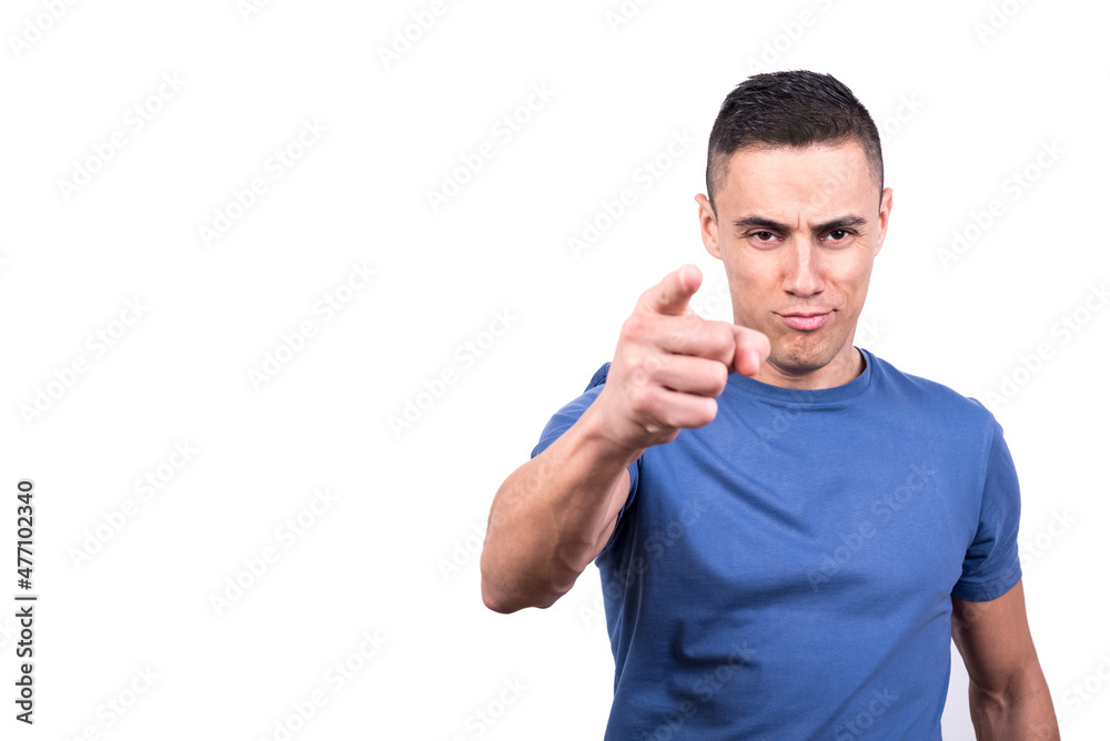 Portrait of a man pointing forward while smiling Portrait of a man pointing forward while smiling