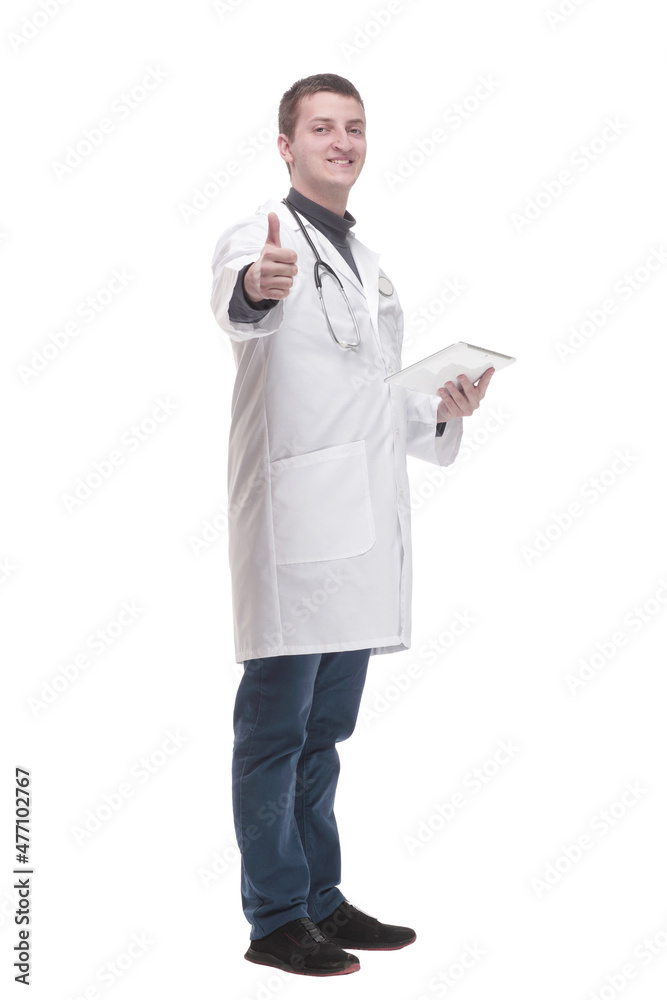 in full growth. modern doctor with a digital tablet. in full growth. modern doctor with a digital tablet.