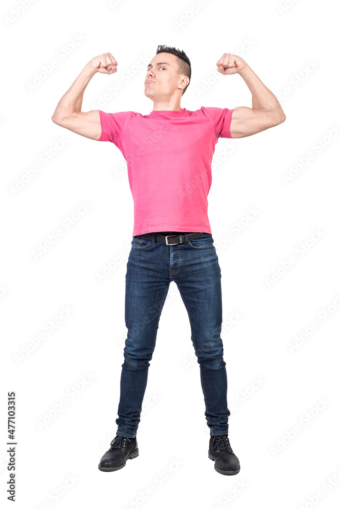 Confident muscular guy showing biceps in white studio Confident muscular guy showing biceps in white studio