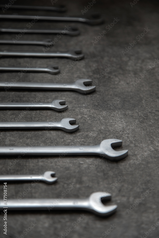 Flexible ratchet wrenches on gray background Flexible ratchet wrenches on gray background