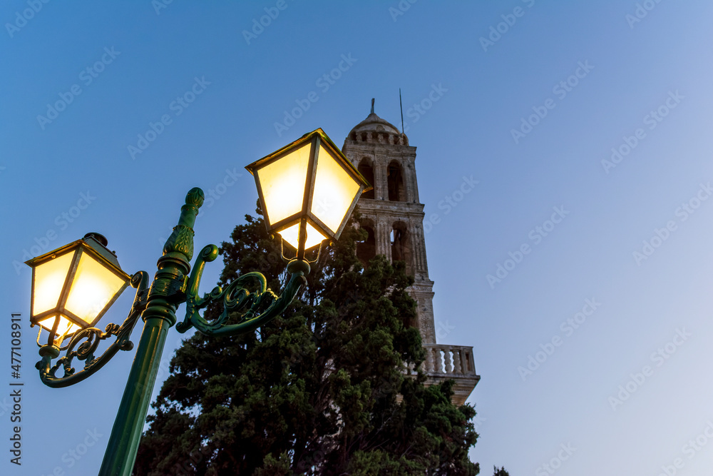 Outdoor lamp in Panagia Myrtidiotissa monastery of Kythira. The temple is dedicated to the Virgin Myrtidiotissa considered the patroness of Kythira.