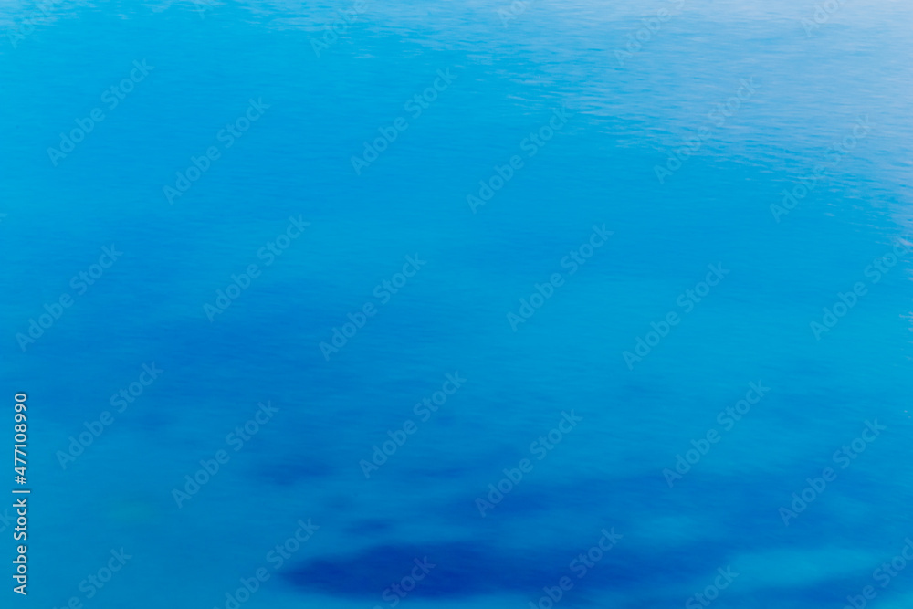 The bright turquoise sea background or pool water background can be used as a background image, suitable for marine or marine life, cartoons or nature.