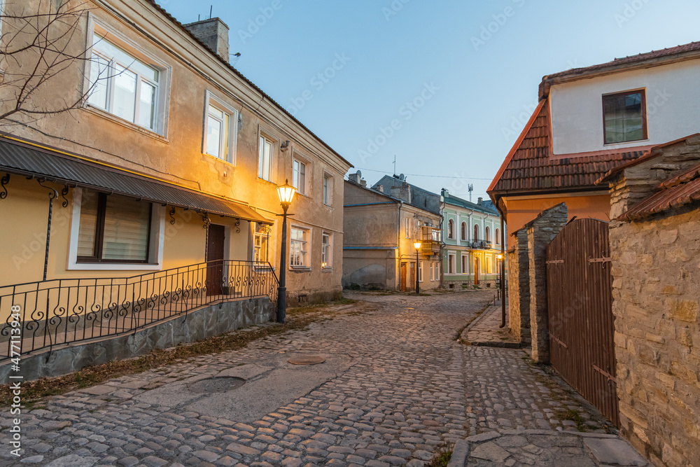 Old medieval European street. Piatnytska street, Kamyanets-Podilsky old town, Ukraine.